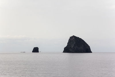 View of calm sea against clear sky