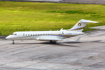 Side view of airplane on runway