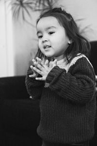 Portrait of cute girl at home