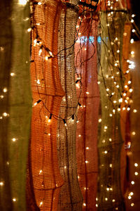 Close-up of christmas decoration hanging at night