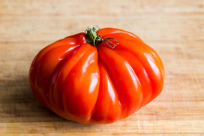 Close-up of red bell peppers on table