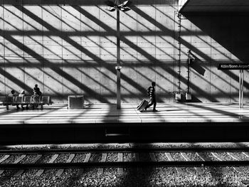 Railroad tracks by station platform