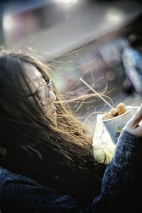 Close-up of woman holding ice cream