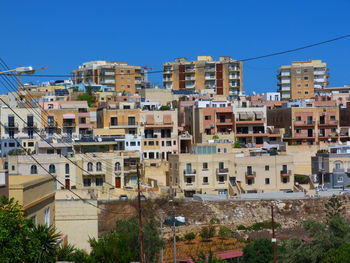Residential buildings against clear sky