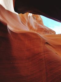 Overhead view of sky through canyon