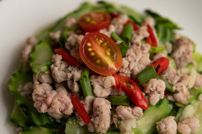 Close-up of chopped vegetables in plate