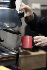 Man holding coffee cup