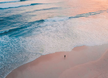 Aerial view of beach during sunset