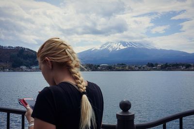 Woman looking at lake