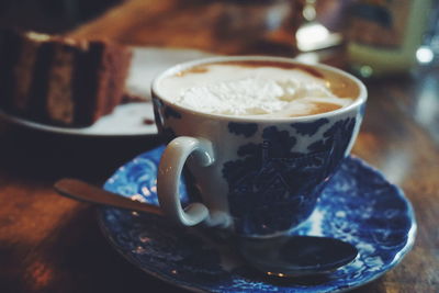 Close-up of coffee cup on table