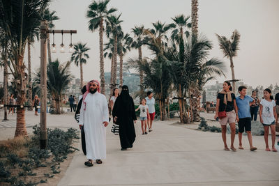 People walking on street in city