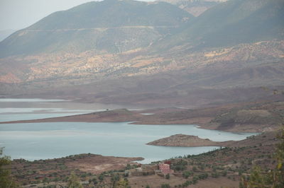 High angle view of lake against mountain range