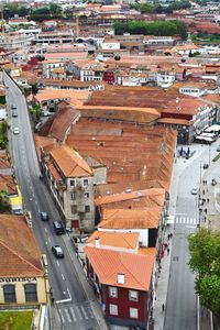 High angle view of street amidst buildings in city