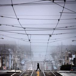 Woman walking on city street