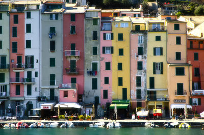 People on boats in city