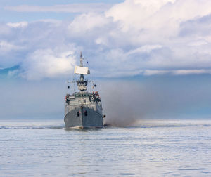 Coast guard ship in the bay of the pacific ocean in kamchatka