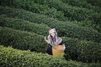 Portrait of farmer in traditional clothing working at farm