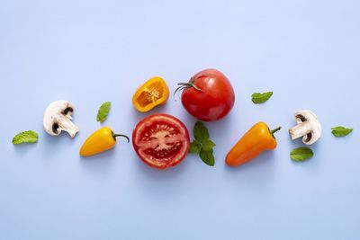 Fruits in plate against white background