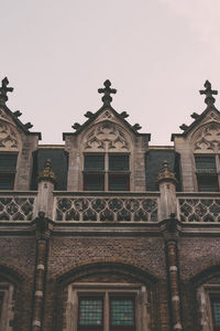 Low angle view of historic building against clear sky