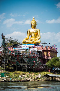 Statue of temple against sky