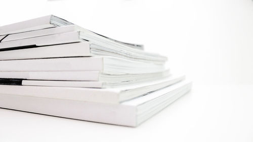 Close-up of books on white background