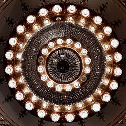 Low angle view of illuminated chandelier