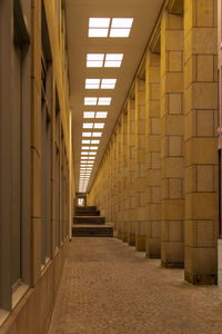 Illuminated corridor of building