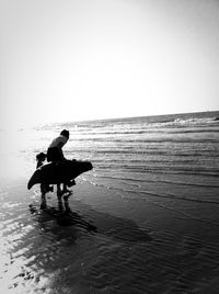 Reflection of woman in water