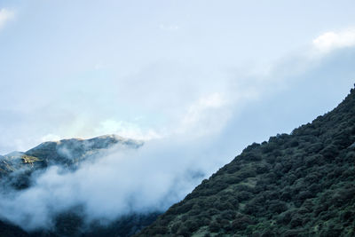 Low angle view of mountains against sky