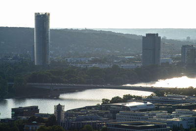 Buildings in city against clear sky