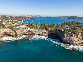 Drone view of the gap, an ocean cliff on the south head peninsula in watson's bay in eastern sydney.