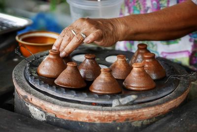 Midsection of woman preparing food