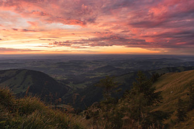 Scenic view of landscape against sky during sunset