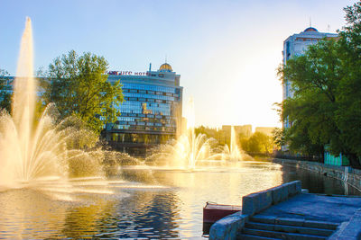 Water fountain against clear sky