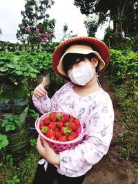 High angle view of woman holding food