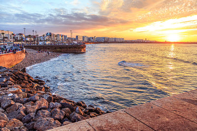 Scenic view of sea against sky during sunset