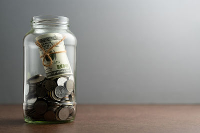 Close-up of coins on table