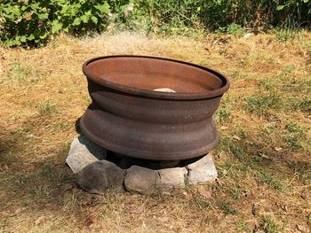 High angle view of old tea light on field