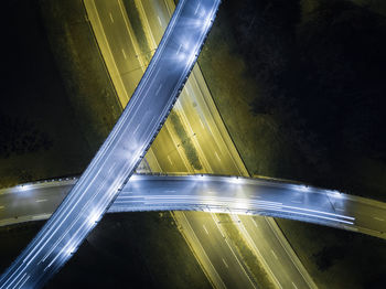 High angle view of light trails on highway