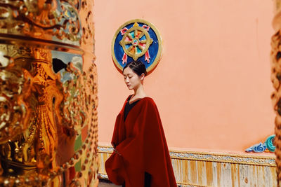 Woman standing in temple