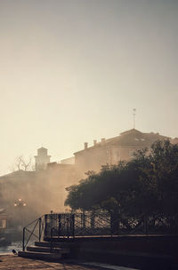 View of built structures against clear sky