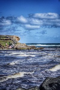 View of sea against cloudy sky