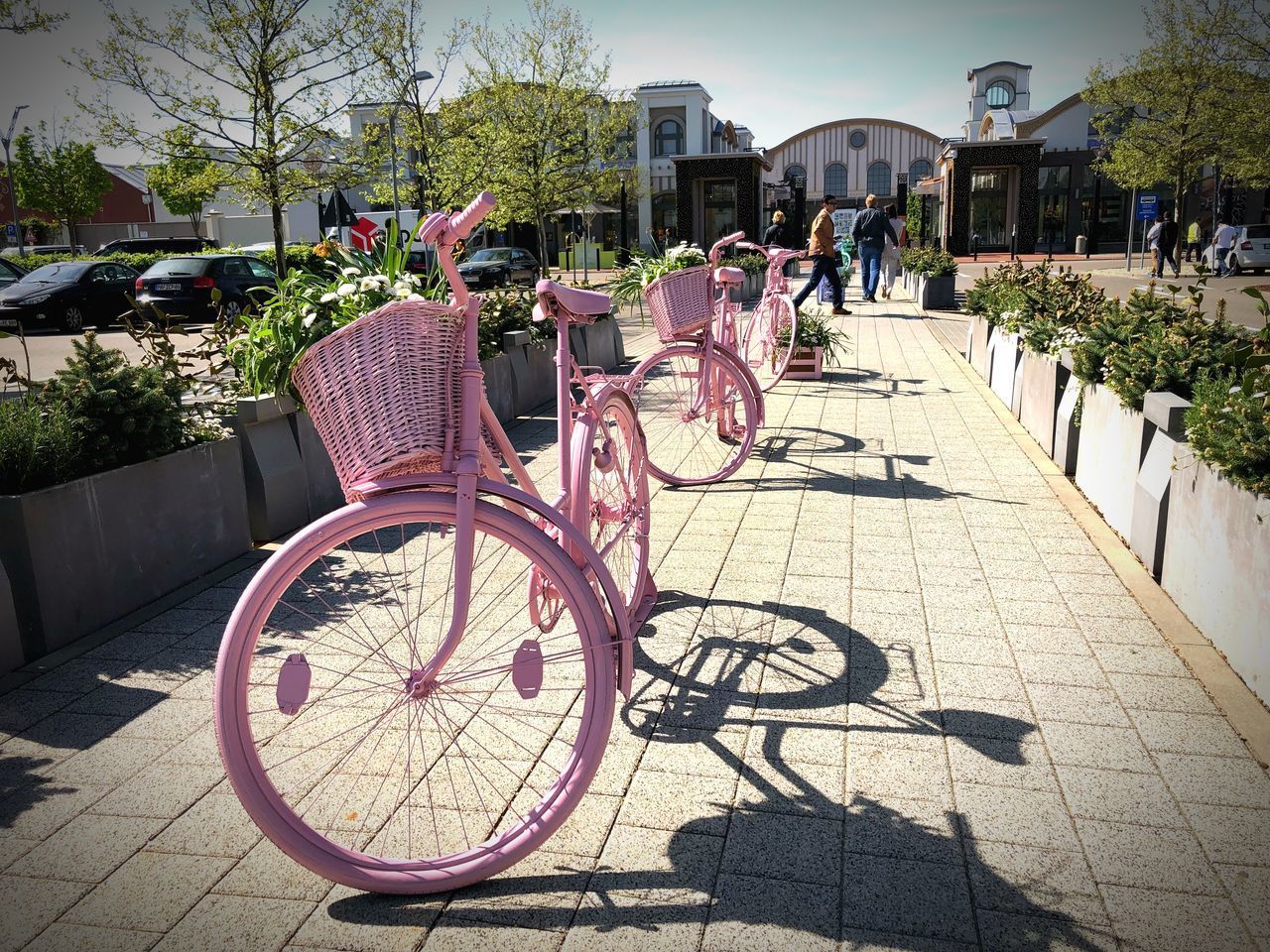 BICYCLES ON FOOTPATH BY STREET