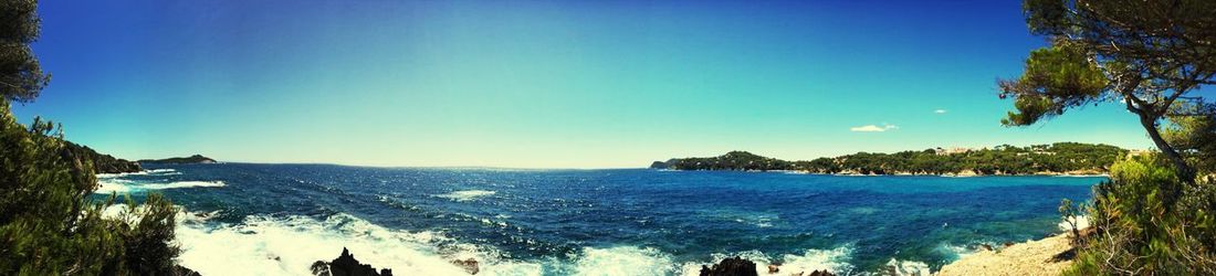 Scenic view of sea against clear sky