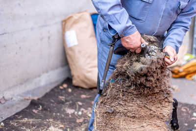 Midsection of man working