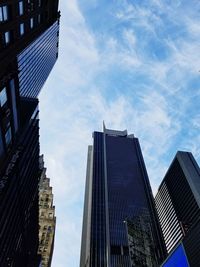 Low angle view of modern buildings against sky