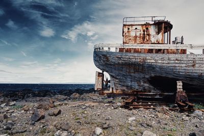 Boat in sea against sky