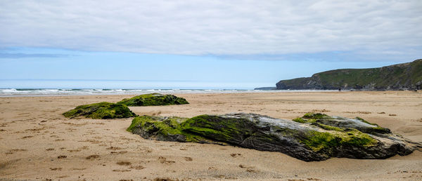 Scenic view of beach against sky