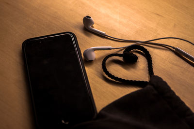 Close-up of smart phone on table
