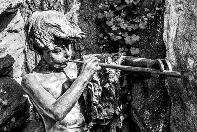 Statue of angel in cemetery